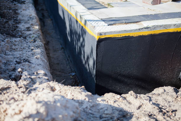 Professional Waterproofing technician working in Phoenix, MD